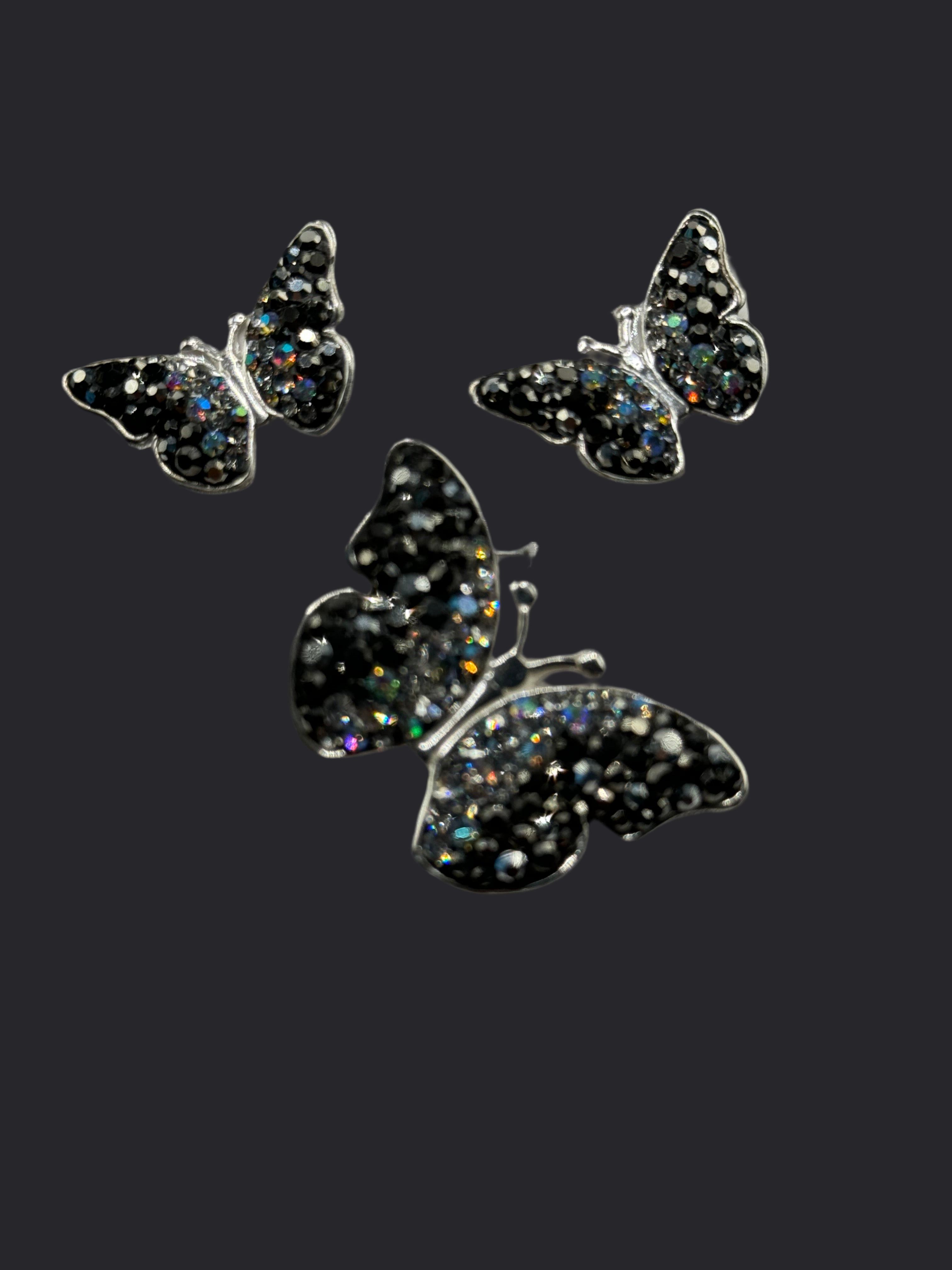 Butterfly Pendant & Earrings in black iridescent crystals .