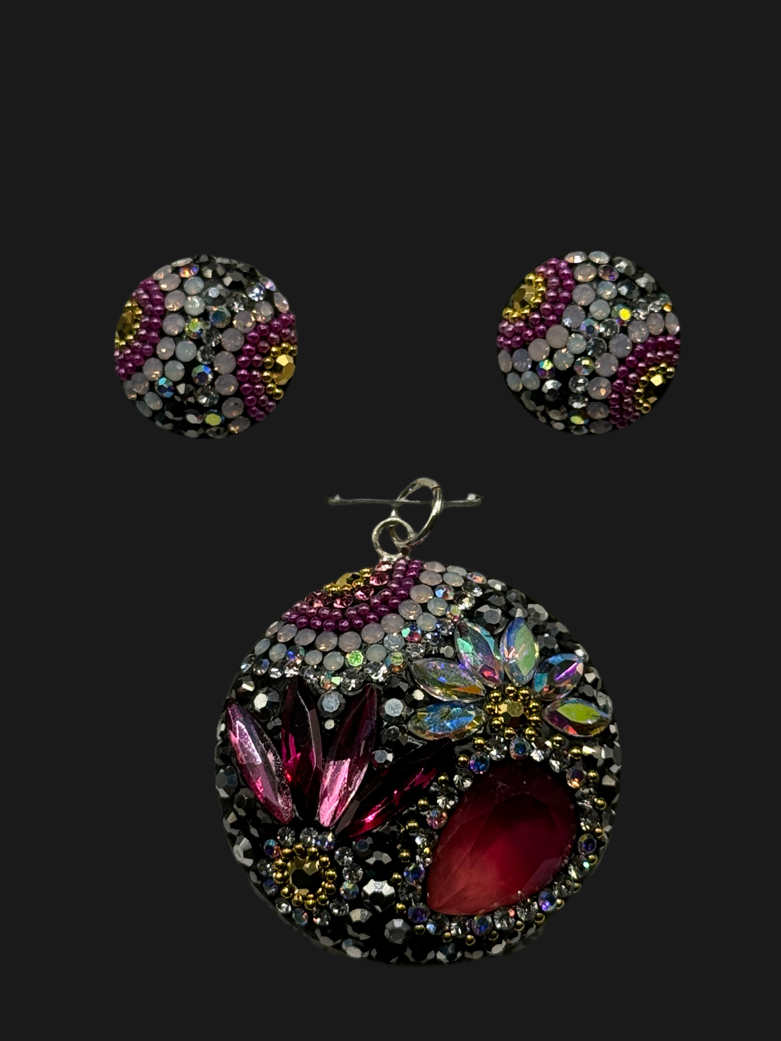 Medallion Circle Pendant & Earrings in fuchsia crystals .