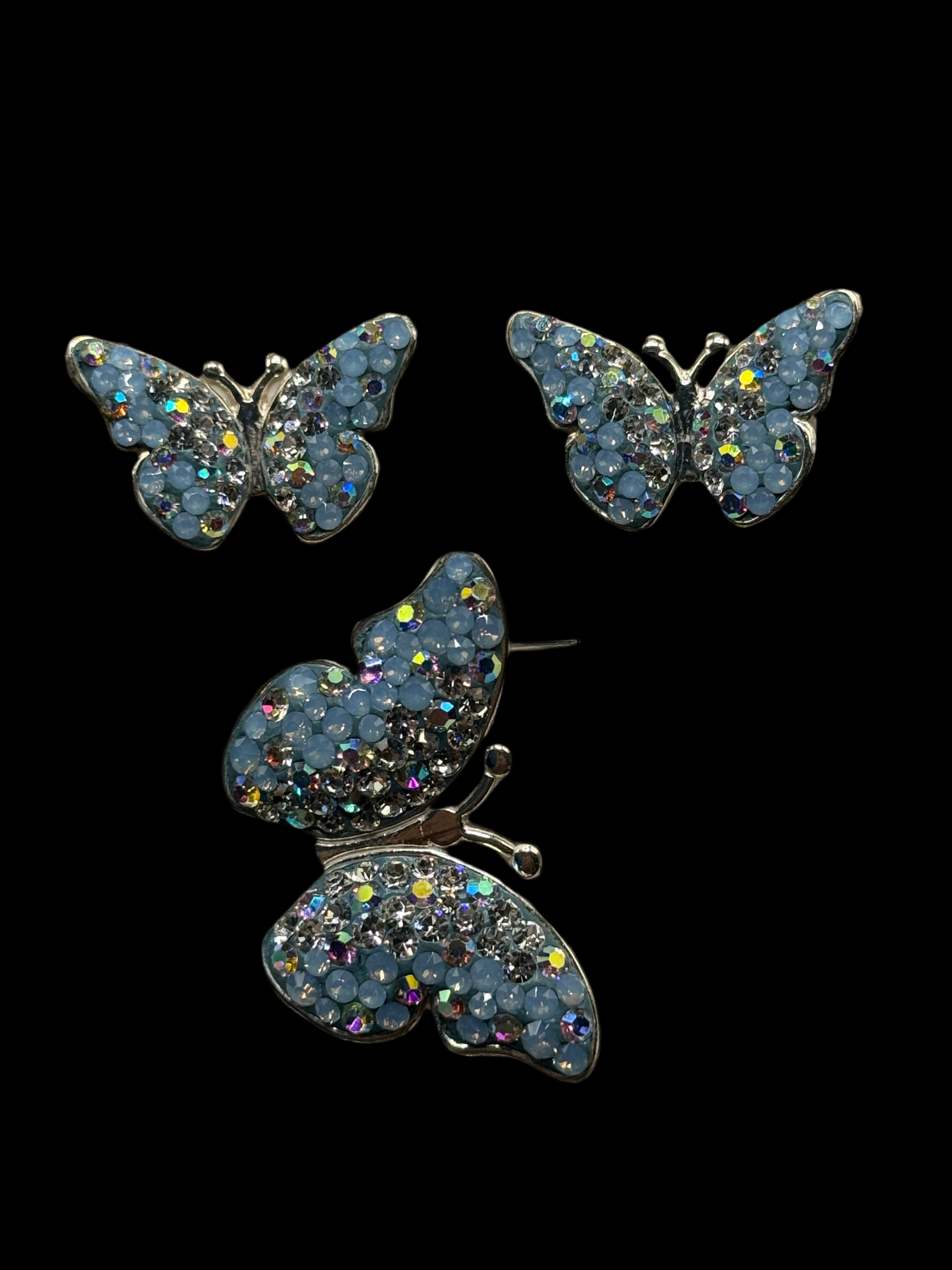 Butterfly Pendant & Earrings in light blue crystals.
