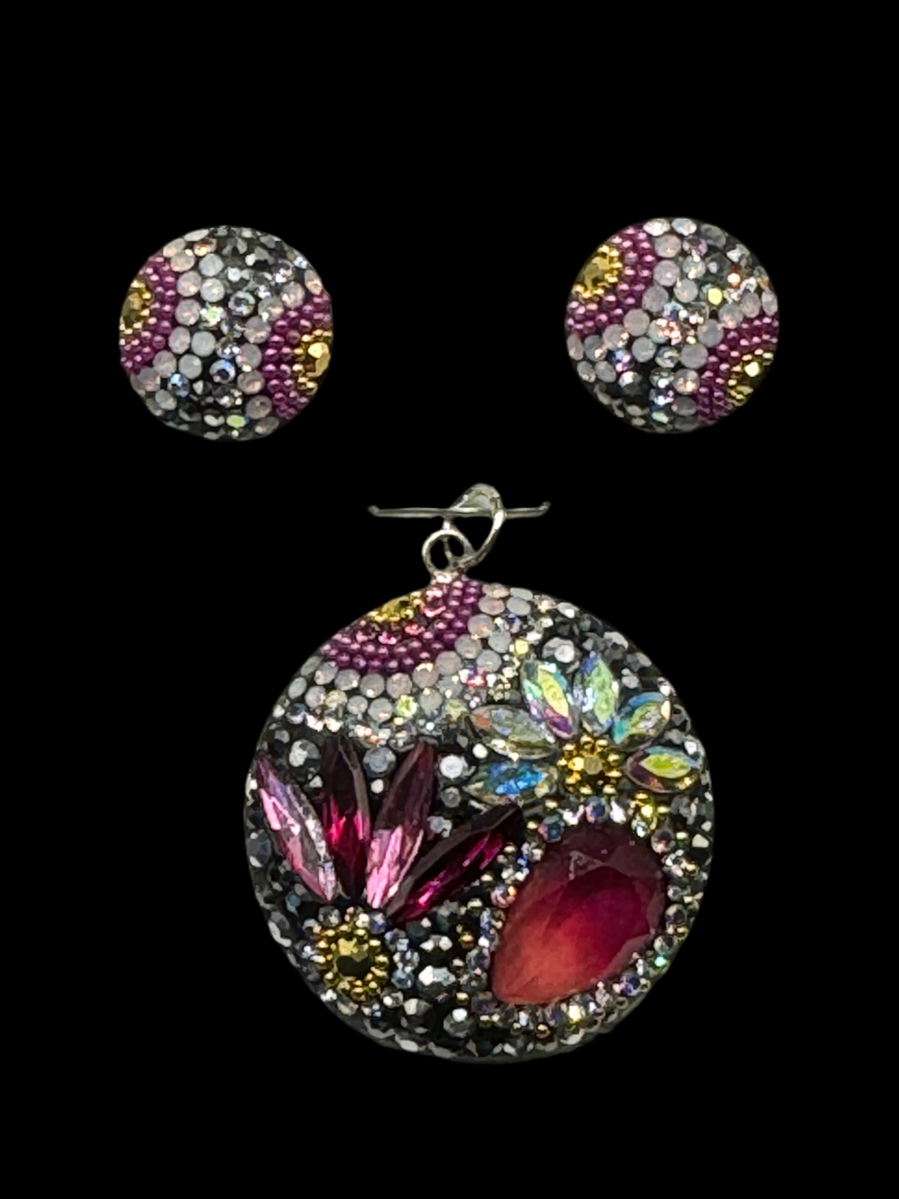 Medallion Circle Pendant & Earrings in fuchsia crystals .