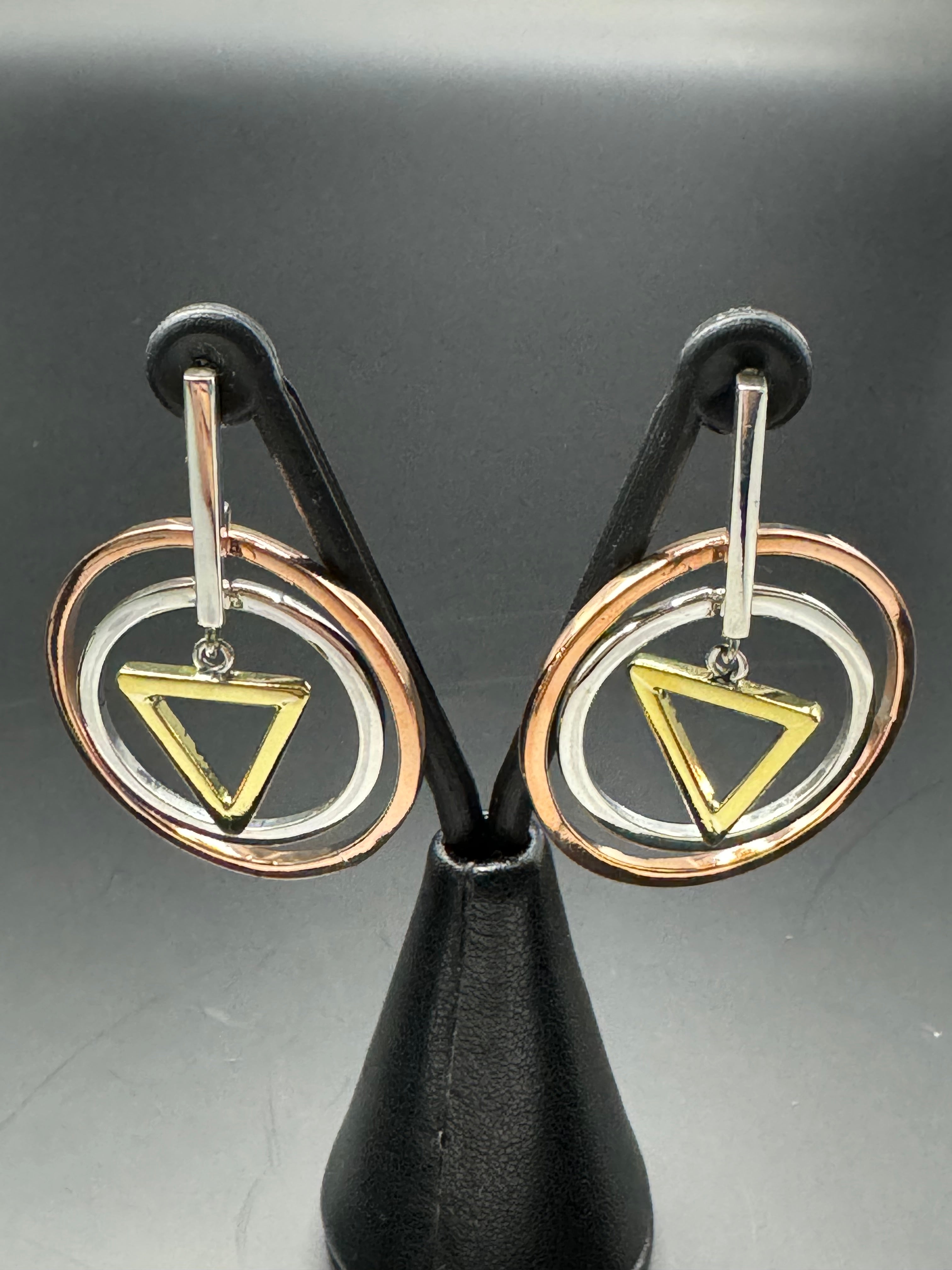 Sterling Silver Circle & Triangle earrings .