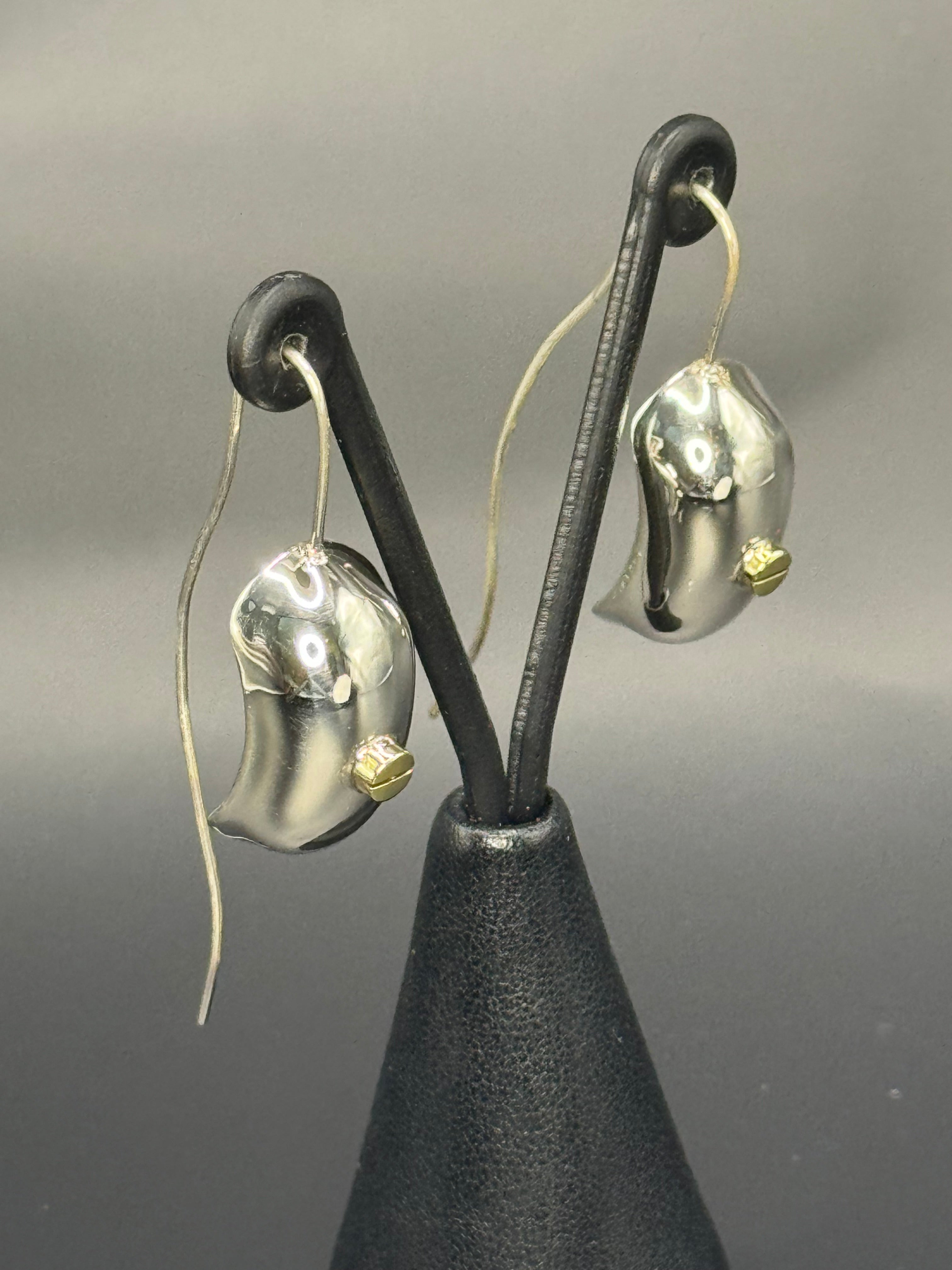 Sterling Silver Unique Fashioned Earrings .