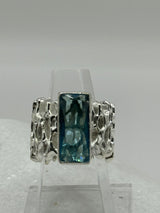 Sterling Silver Opulent Crystal Blue Topaz Ring .