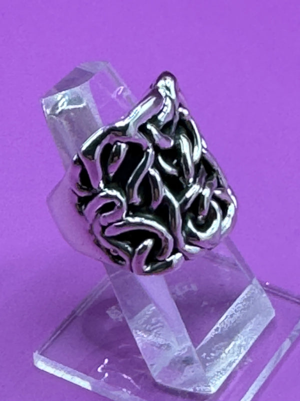 Sterling Silver Ring with twists of rope .