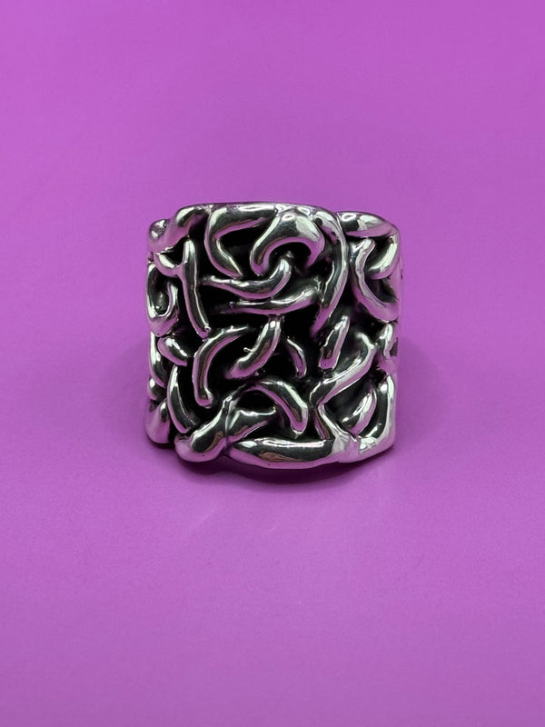 Sterling Silver Ring with twists of rope .