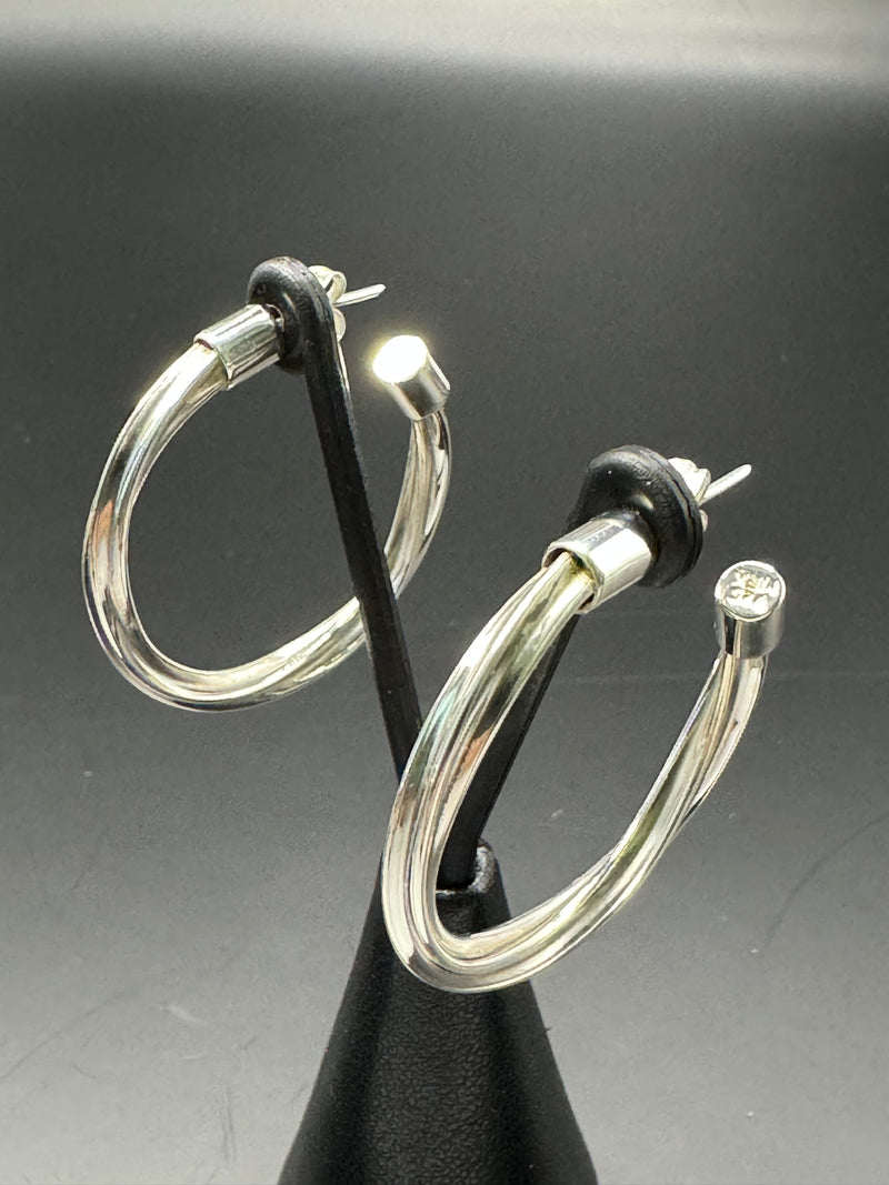 Sterling Silver twisted hoop earrings .