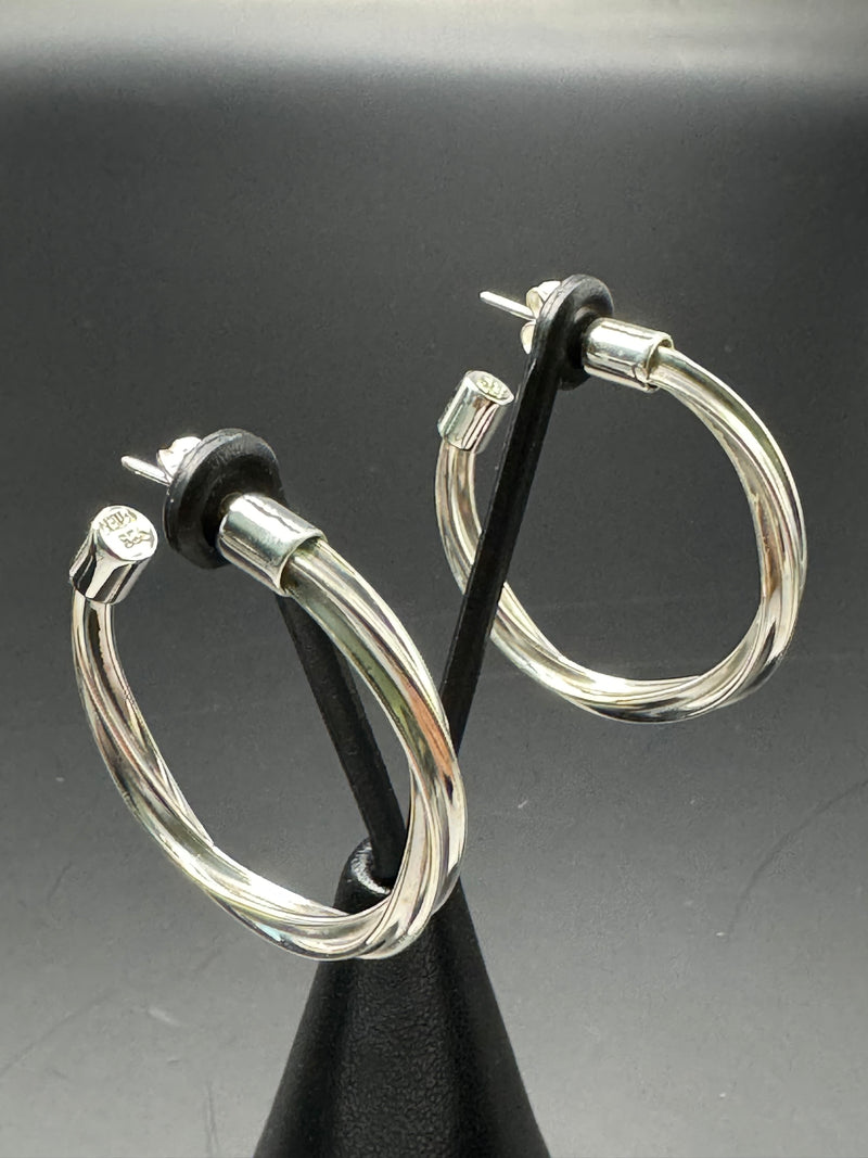 Sterling Silver twisted hoop earrings .