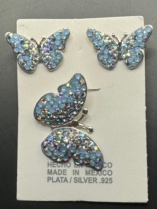 Butterfly Pendant & Earrings in light blue crystals. Medium size .