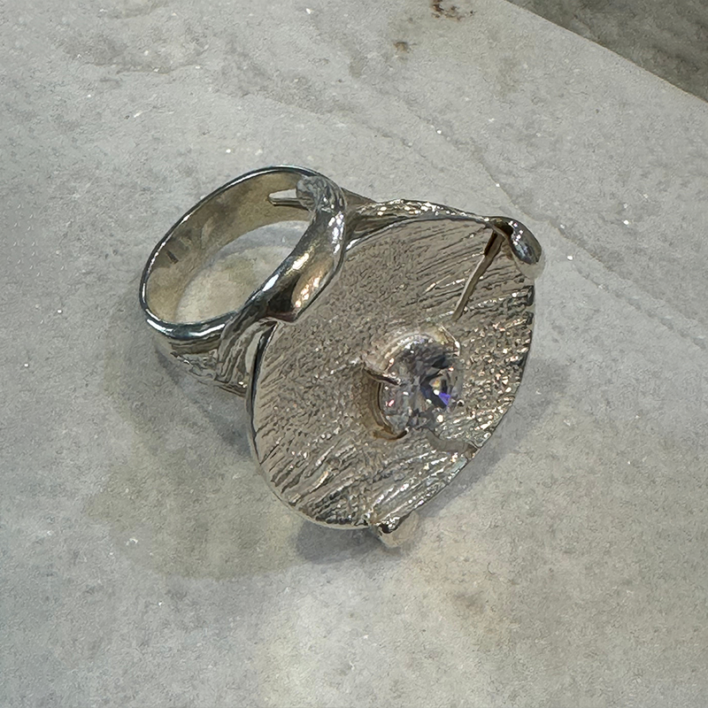 Sterling Silver Coin Ring with Crystal stone.